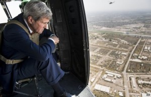 John Kerry flew over Baghdad in a helicopter before meeting Prime Minister Haidar al-Abadi. Photo: AP