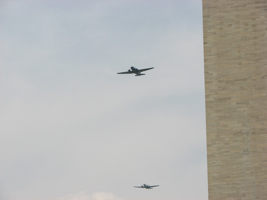 World War II-era aircraft flying over the National Mall in Washington, DC to commemorate V-E Day. Photo: Jordana Merran.