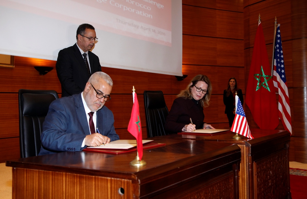 Moroccan Prime Minister Abdelilah Benkirane and MCC CEO Dana J. Hyde sign the second MCC compact.