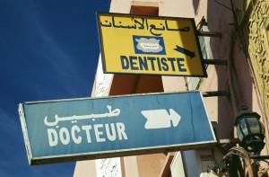 Signs for a doctor's and dentist's office in Morocco. Photo: Bryan Thomas on Flickr.